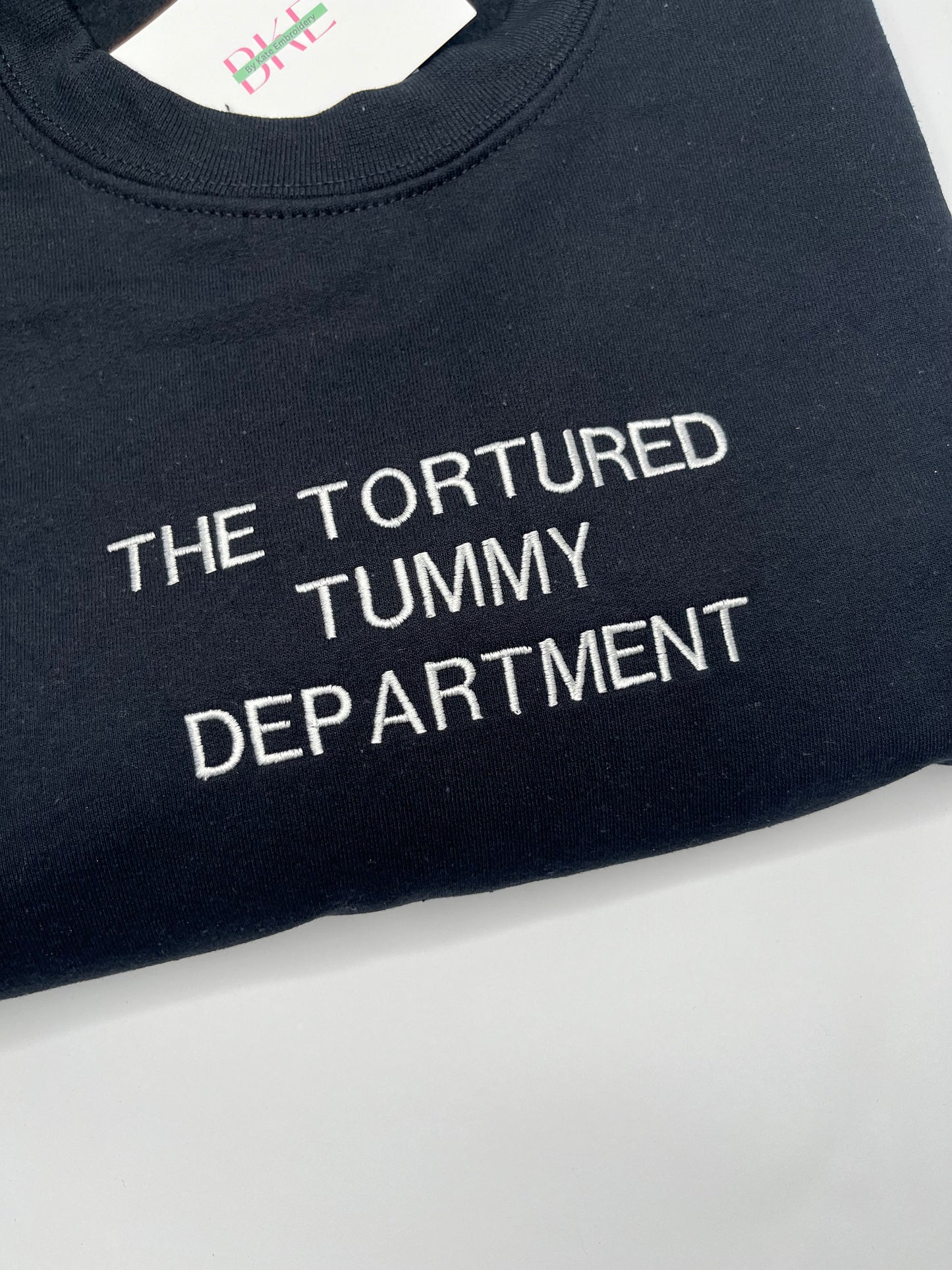 TORTURED TUMMY DEPARTMENT EMBROIDERED SWEATSHIRT