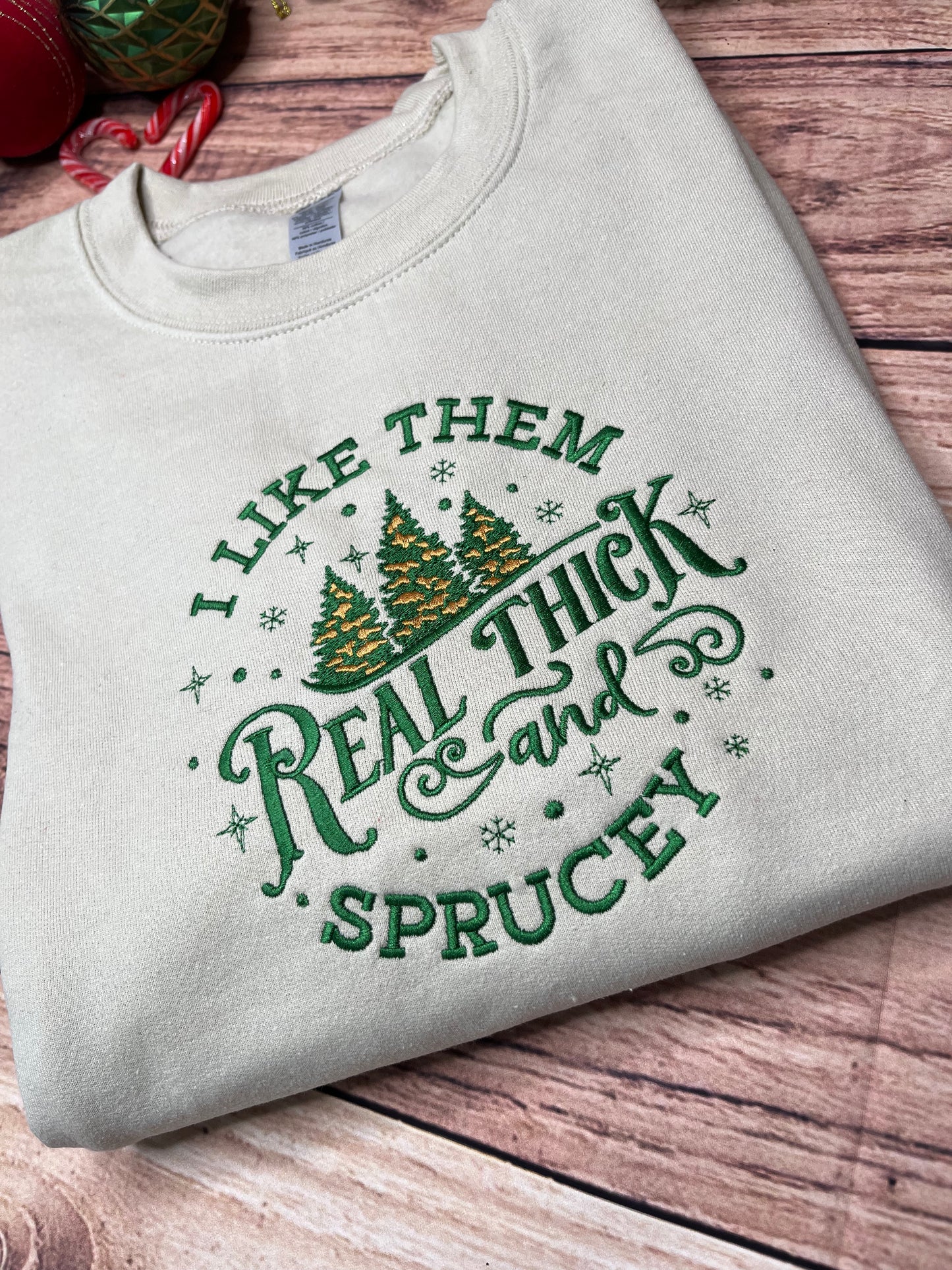 CHRISTMAS I LIKE THEM REAL THICK AND SPRUCEY SWEATSHIRT