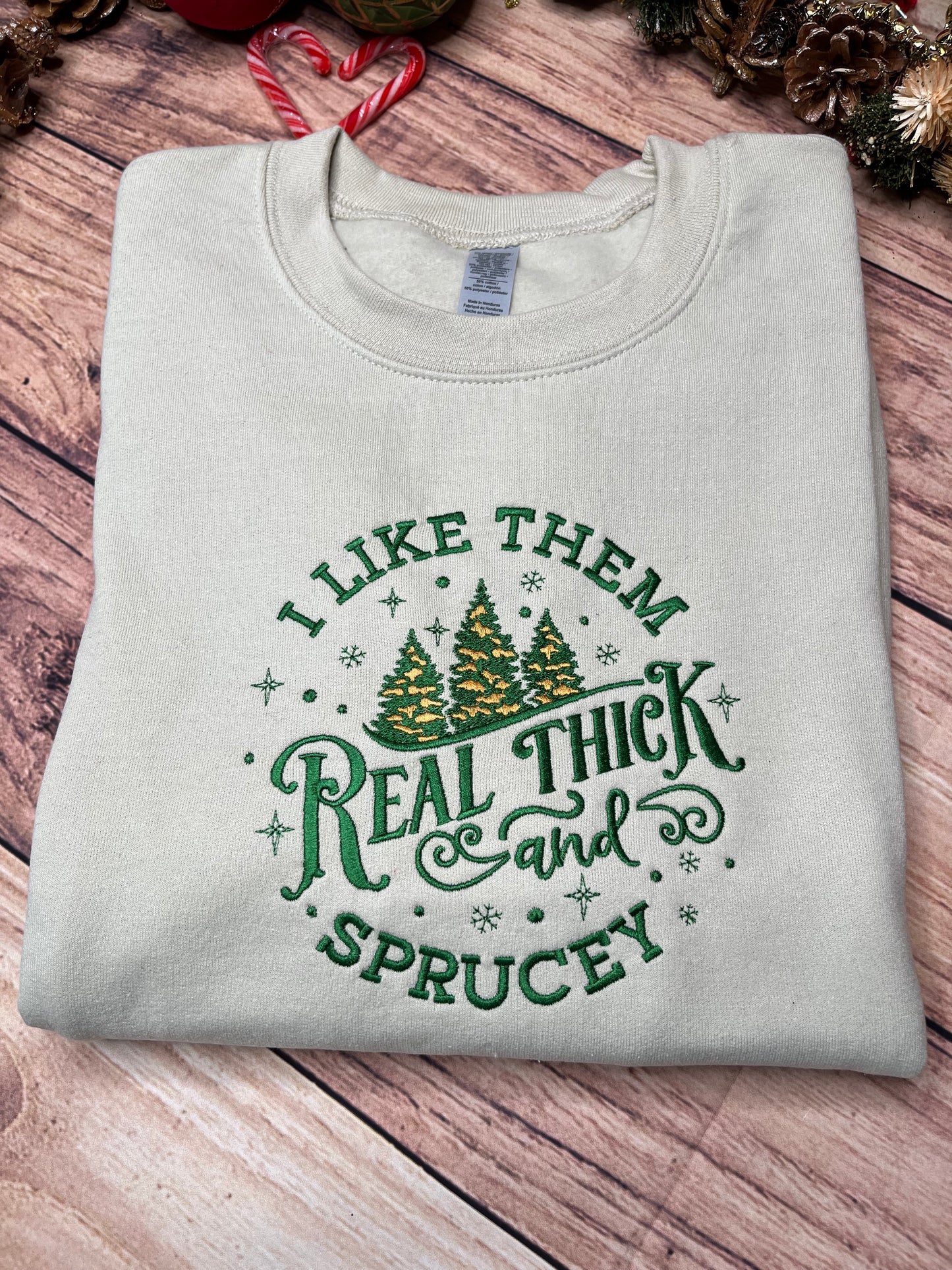 CHRISTMAS I LIKE THEM REAL THICK AND SPRUCEY SWEATSHIRT
