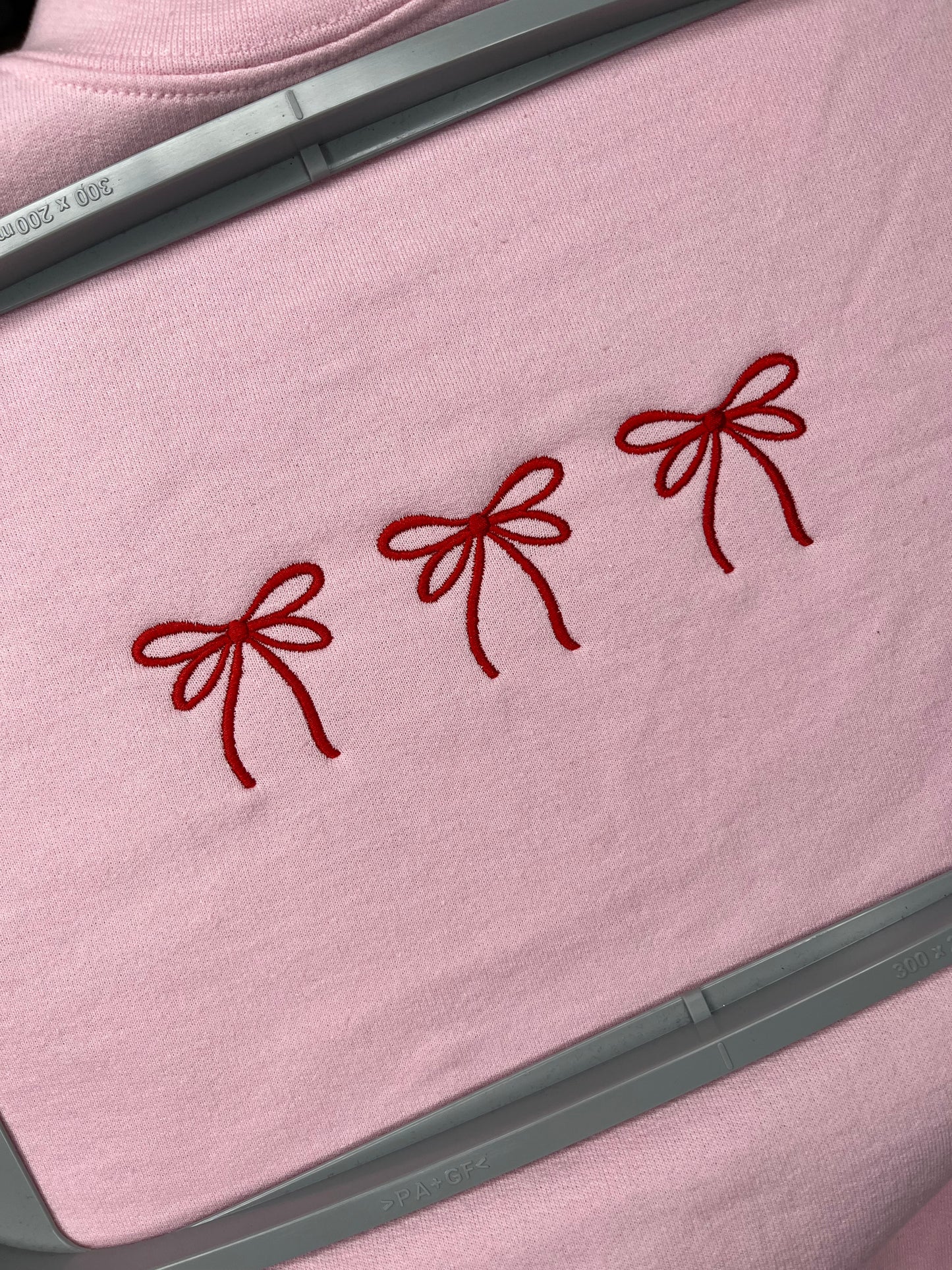 EMBROIDERED BOWS