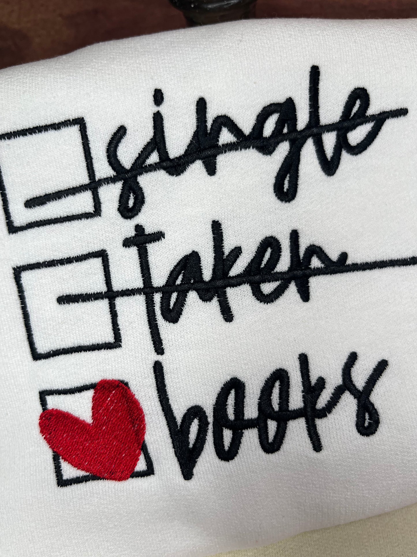 SINGLE, TAKEN BOOKS EMBROIDERED SWEATSHIRT