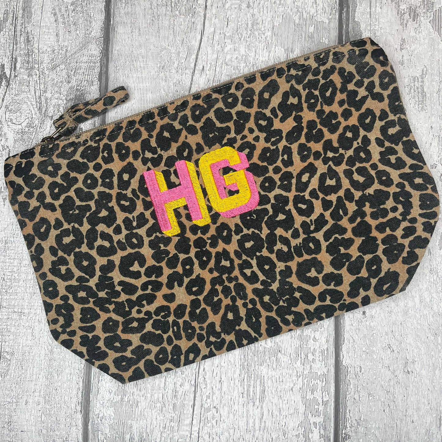 EMBROIDERED ANIMAL PRINT SHADOW FONT POUCH