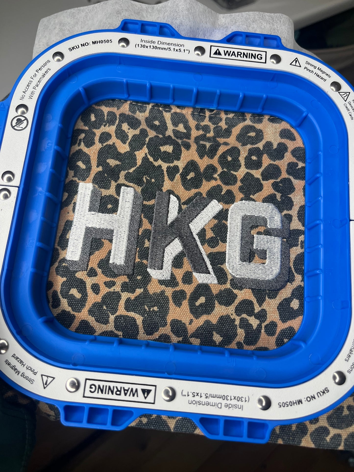 EMBROIDERED ANIMAL PRINT SHADOW FONT POUCH