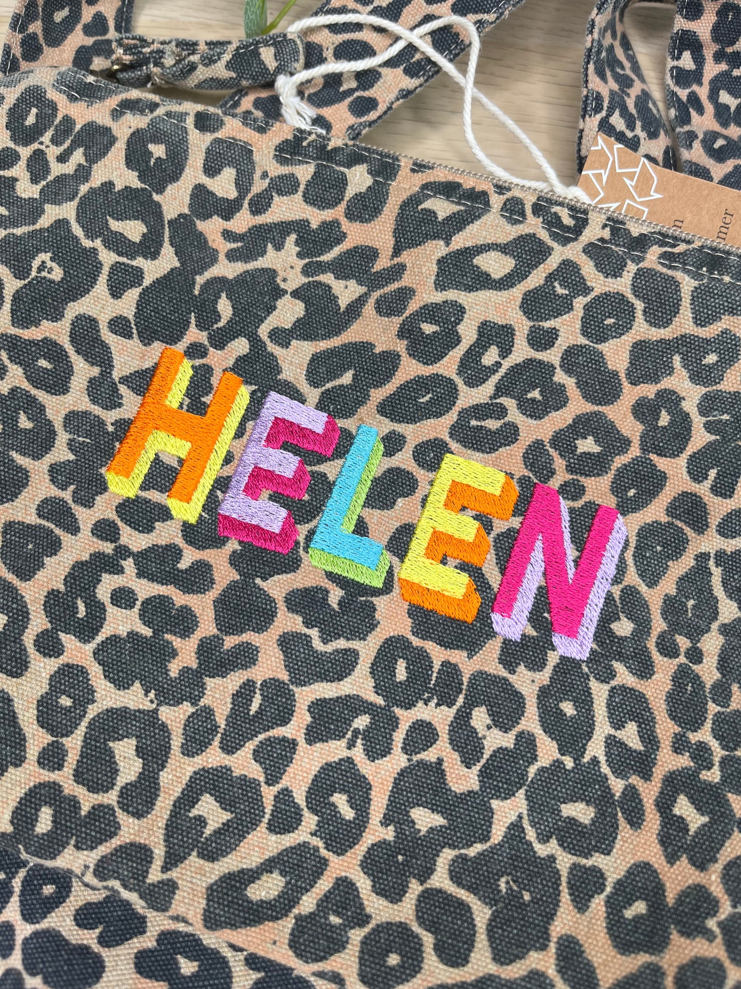 EMBROIDERED ANIMAL PRINT SHADOW FONT POUCH