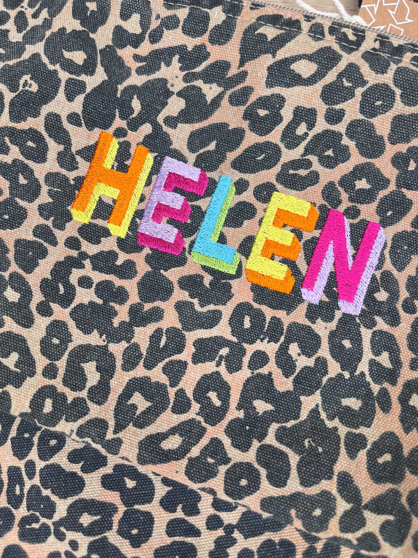 EMBROIDERED ANIMAL PRINT SHADOW FONT POUCH