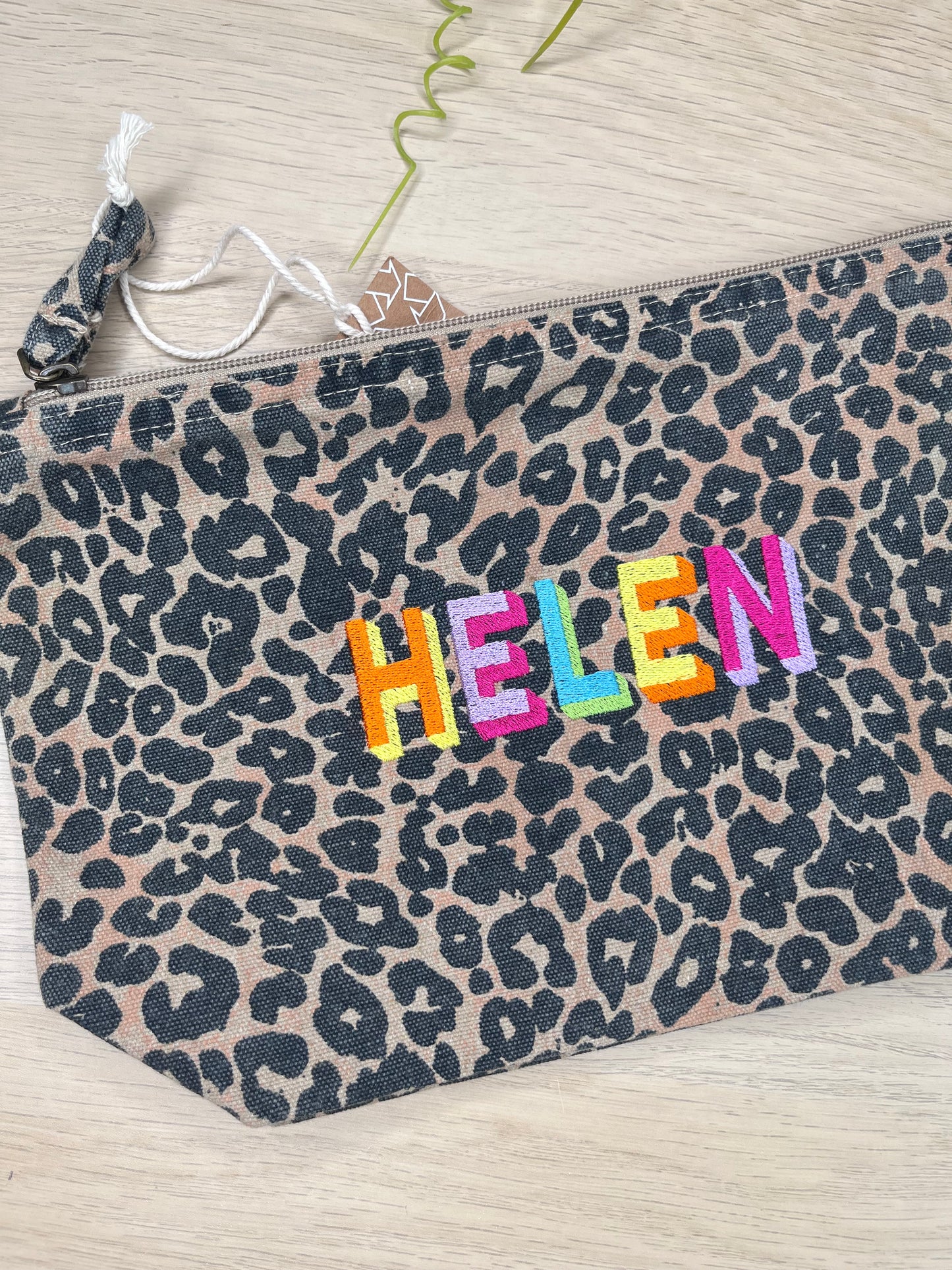 EMBROIDERED ANIMAL PRINT SHADOW FONT POUCH