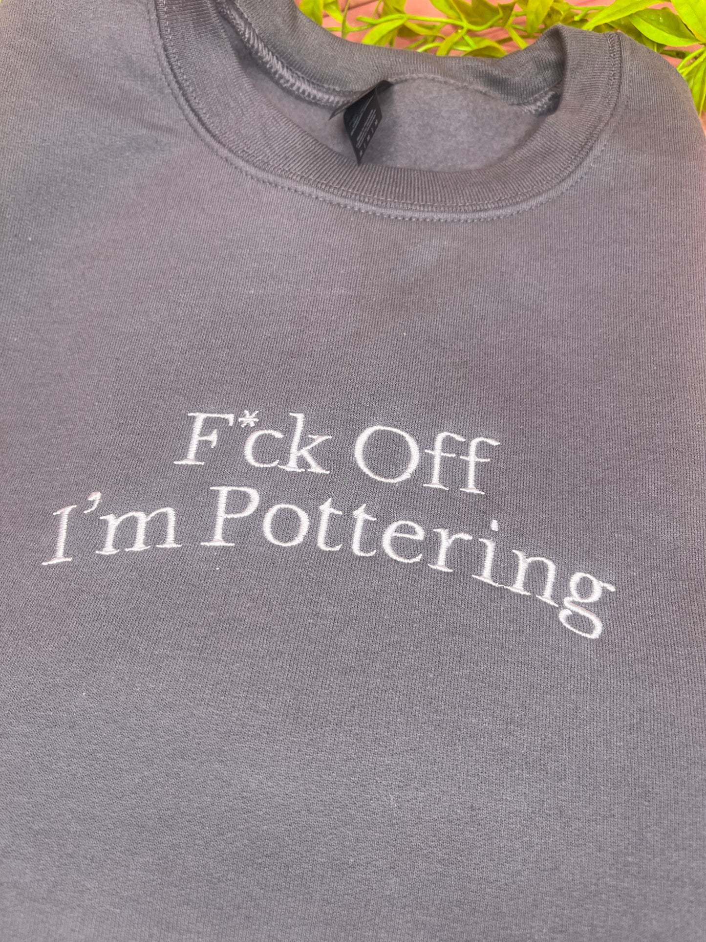 F*CK OFF IM POTTERING EMBROIDERED SWEATSHIRT