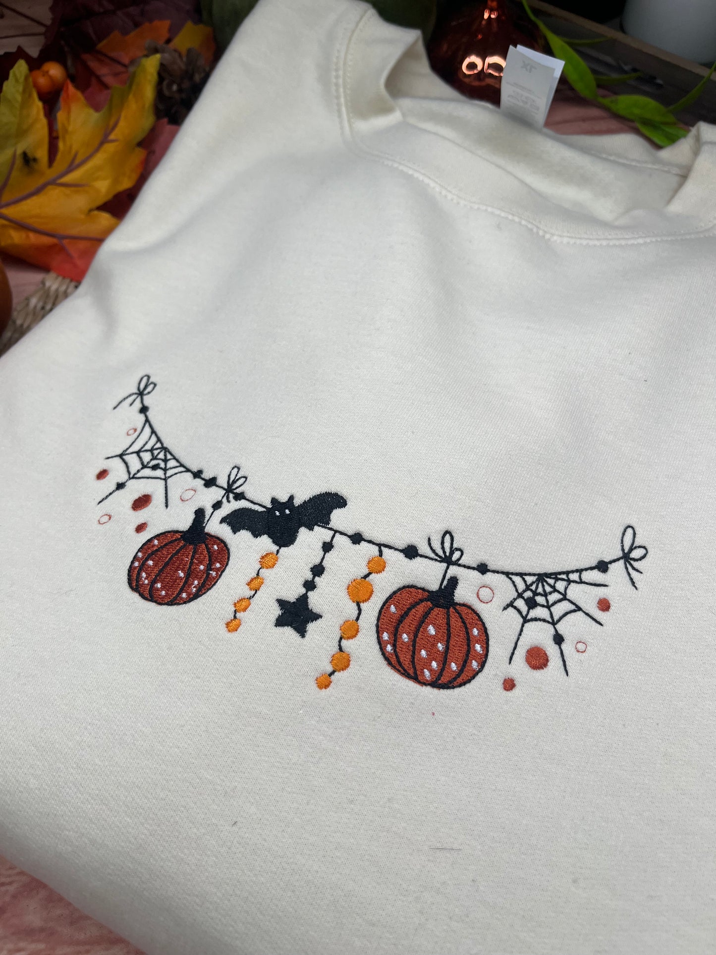 SPOOKY SEASON GARLAND EMBROIDERED SWEATSHIRT
